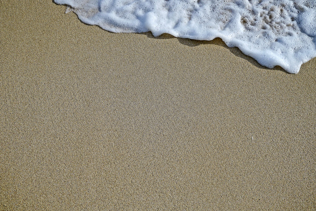Water meets sand, North Shore, Oahu, Hawaii