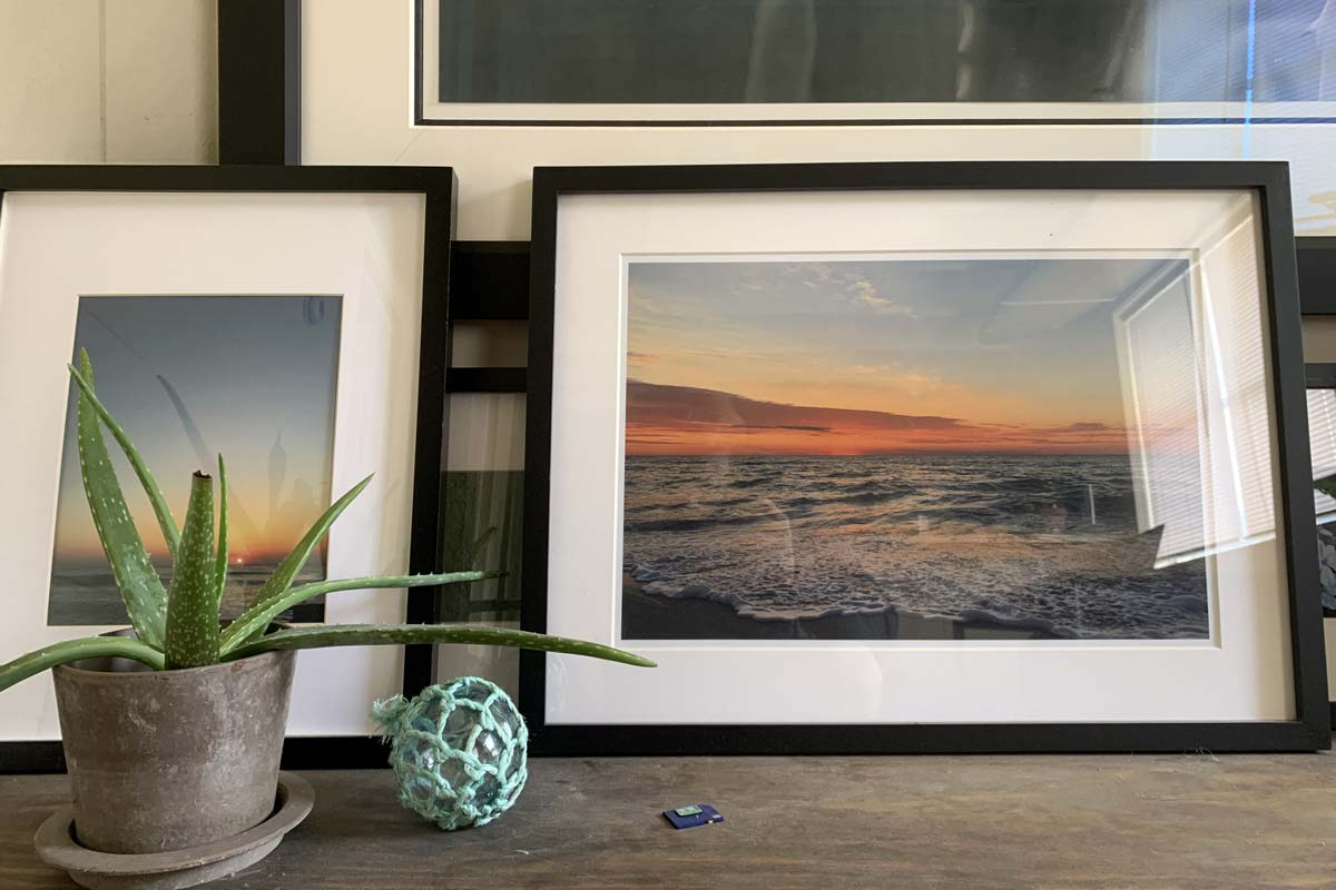 framed photographs beach shack decor