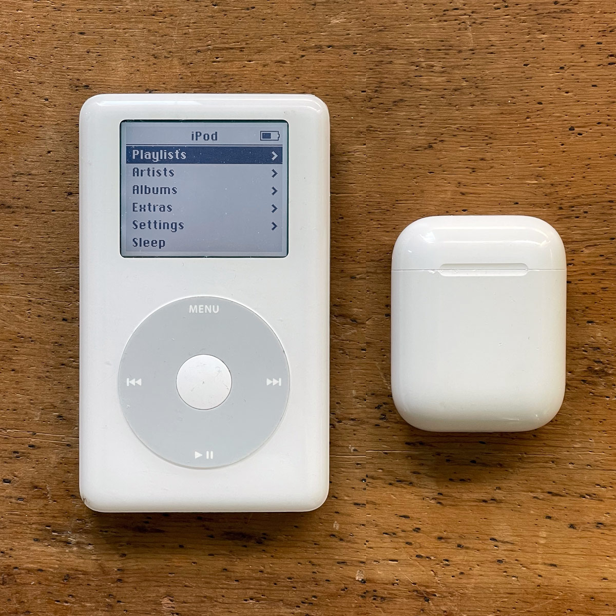 Apple iPod 4G (circa 2004) and Apple Airpods (circa 2020) iPod 4G Airpods Apple