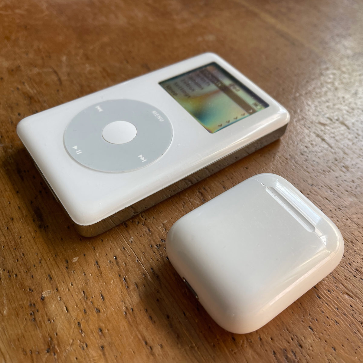 Apple iPod 4G (circa 2004) and Apple Airpods (circa 2020) iPod 4G Airpods Apple