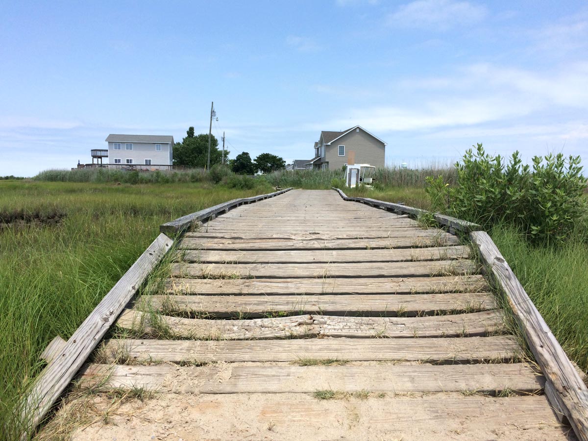 Tangier Island golf cart, bike, and footbridge